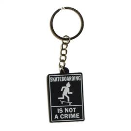NOT A CRIME KEYCHAIN